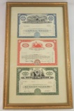 Framed group of three stock certificates