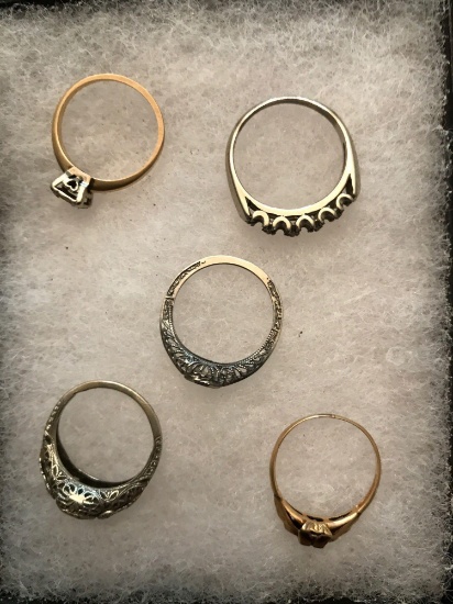 Group of five 14 karat gold rings