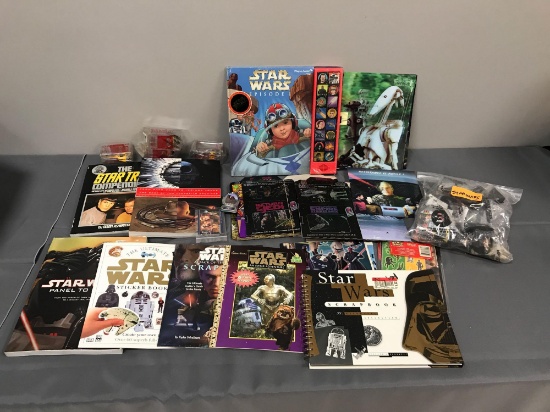 Group of Star Wars books, toy premiums, and others