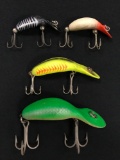 Four vintage Heddon tad poly fishing Lures