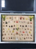 Case with 74 vintage fishing flies