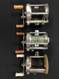Three vintage Pflueger fishing reels