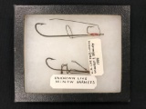 Two antique bait harnesses