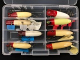 Case with vintage wooden lures