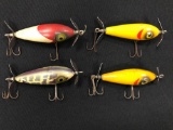 Four vintage South Bend fishing lures