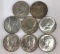 Group of eight 1964 Kennedy silver half-dollars