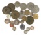 Group of tokens, foreign currency, and US currency