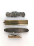 Group of four vintage pocket knives and comb