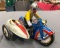 Vintage tin windup toy motorcycle with sidecar