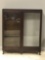 Vintage wood cabinet with glass doors