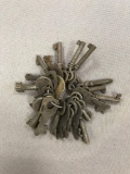Group of 23 antique keys on a ring