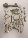 Group of 18 vintage brass keys and more