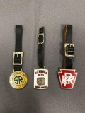 Group of 3 advertising fobs