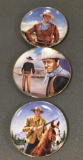 Group of three John Wayne collector plates