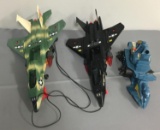 Group of 2 airplanes, and one toy vehicle