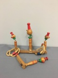 Vintage wooden ring toss game with rope rings