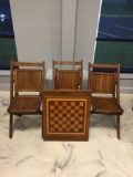Three vintage wooden folding chairs, and one in vintage wooden table top with chessboard