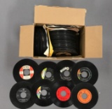 Group of 100 or more vintage 45s records