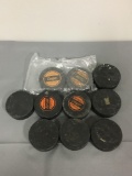 Group of 10 official hockey pucks