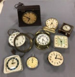 Group of 9 vintage clocks and parts