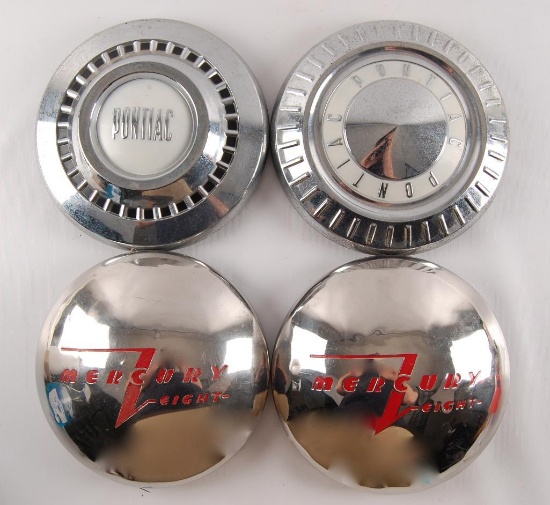 Group of 4 Vintage Pontiac and Mercury Hub Caps