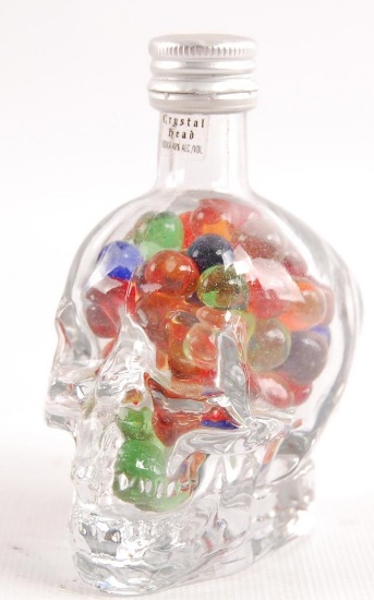 Small Skull Bottle Full of Vintage Peltier Marbles