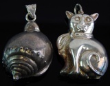 Pair of Full-Bodied Figural Sterling Silver Pendants