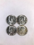 Group of 4 Kennedy silver half-dollars