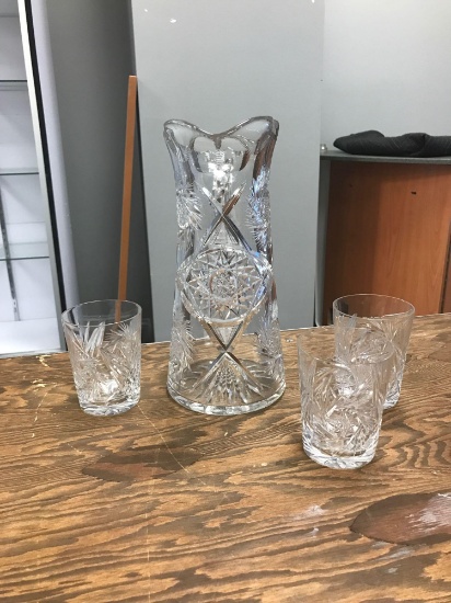 Vintage cut glass pitcher with three tumblers