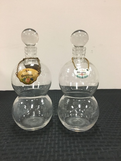 Group of 2 vintage clear glass decanters