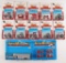 Group of 12 ERTL Farm Machines 1/64 Scale Toy Tractors Most in Original Packaging