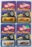 Group of 4 Hot Wheels Real Riders Formula 1 Die-Cast Cars in Original Packaging