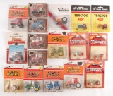 Group of 17 ERTL and Others 1/64 Scale Toy Tractors in Original Packaging