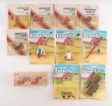 Group of 11 ERTL and Others 1/64 Scale Tractors and Implements in Original Packaging