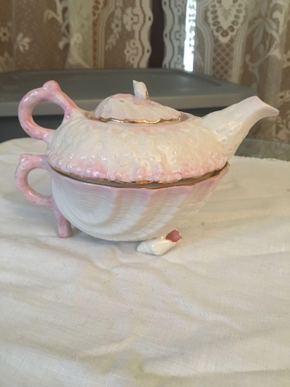 Seashell teapot and cup by Belleek