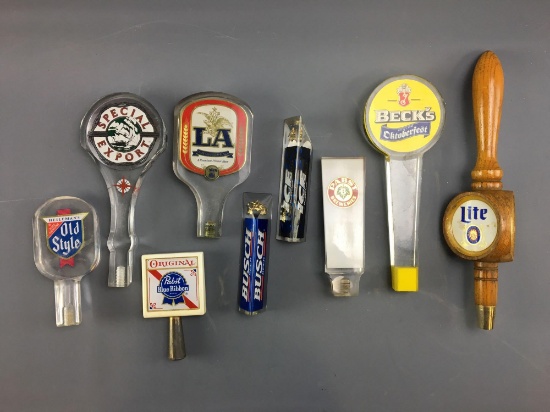 Group of 9 vintage beer tappers