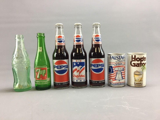 Group of 7 vintage soda pop bottles and beer cans