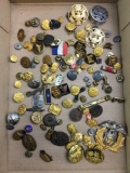 Group of vintage military buttons, pins and more