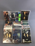 Large group of X Files books and comics