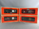Group of 4 Holiday themed Lionel Boxcars New in Package