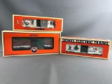 Group of Lionel Holiday Boxcars New in Package