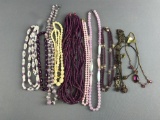 Lot of purple and pink costume jewelry