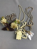 Lot of costume jewelry, beaded floral piece