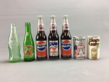 Group of 7 vintage soda pop bottles and beer cans