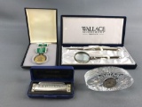 Group of items- harmonica, Crystal clock and others