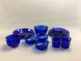 Group of 23 pieces of blue glass dishes