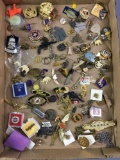 Group of assorted pin backs and more