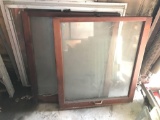 Group of two single panel antique wood windows