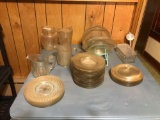 Group of clear glass dishes and pictures