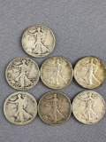 Group of walking Liberty Half Dollar Coins